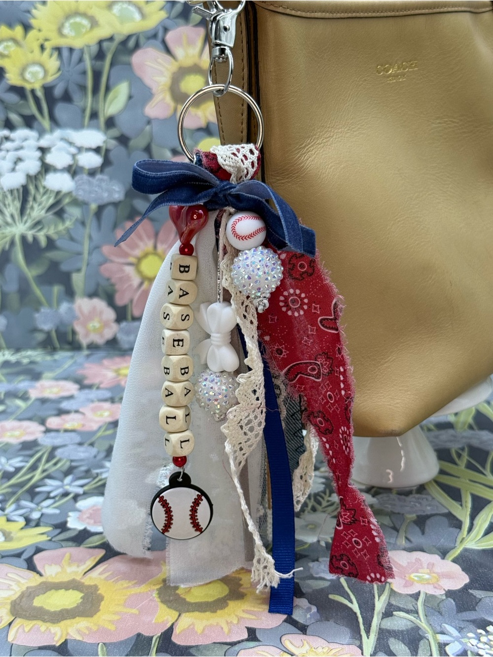 Adorned Crown Jewelry purse bag charm keychain baseball fabric tassel